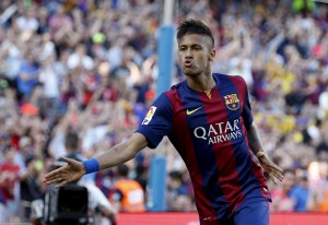 Barcelona's Neymar celebrates his goal against Real Sociedad during their Spanish first division soccer matchat Nou Camp stadium in Barcelona, Spain, May 9, 2015. REUTERS/Gustau Nacarino