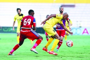 Al Wasl’s  Soccer player  Hassan Ameen (R) Vies the ball with Talal of Al Shaab  during their Arabian Gulf  Match  between  Al Wasl Vs  Al Shaab  at Zabeel  Stadium Dubai on Aug,28,2015 photo by Nasser Babu