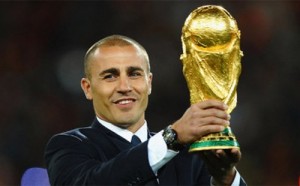 JOHANNESBURG, SOUTH AFRICA - JULY 11:  Fabio Cannavaro of Italy presents the World Cup trophy prior to the 2010 FIFA World Cup South Africa Final match between Netherlands and Spain at Soccer City Stadium on July 11, 2010 in Johannesburg, South Africa.  (Photo by Laurence Griffiths/Getty Images)