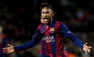 Barcelona's Neymar celebrates after scoring a goal against Paris St Germain during their Champions League Group F soccer match at the Nou Camp stadium in Barcelona, December 10, 2014.            REUTERS/Albert Gea (SPAIN  - Tags: SPORT SOCCER)