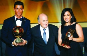 Real Madrid and Portugal forward Cristiano Ronaldo holds his FIFA Ballon d'Or award as he poses with FIFA President Joseph Blatter and winner of the FIFA Women's World Player of the Year Nadine Kessler of Germany (L-R) during the FIFA Ballon d'Or 2014 soccer awards ceremony at the Kongresshaus in Zurich January 12, 2015. REUTERS/Ruben Sprich (SWITZERLAND  - Tags: SPORT SOCCER TPX IMAGES OF THE DAY)