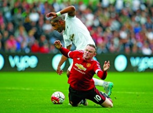 Football - Swansea City v Manchester United - Barclays Premier League - Liberty Stadium - 30/8/15 Manchester United's Wayne Rooney in action with Swansea's Ashley Williams Action Images via Reuters / John Sibley Livepic EDITORIAL USE ONLY. No use with unauthorized audio, video, data, fixture lists, club/league logos or "live" services. Online in-match use limited to 45 images, no video emulation. No use in betting, games or single club/league/player publications.  Please contact your account representative for further details.